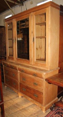 Pine glazed bookcase with 6 drawers